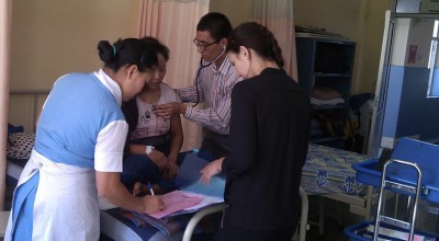 Doctor doing Morning Rounds in the Wards